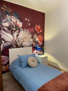 Łóżko lub łóżka w pokoju w obiekcie The Loft E&E Chianti Room
