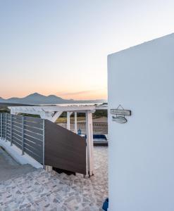 a basketball hoop sitting on top of a porch at Santa Marina Milos in Mytakas