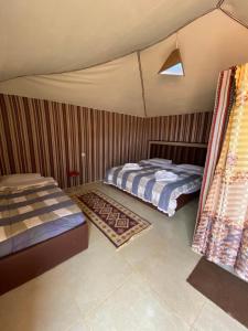 Llit o llits en una habitació de wadi rum land mars