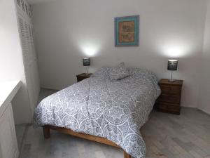 Postel nebo postele na pokoji v ubytování casa HIKURI