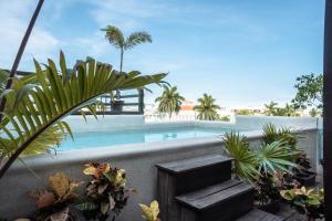 Bazén v ubytování Maui Hostels Playa del Carmen nebo v jeho okolí