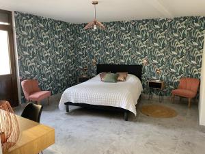 Postel nebo postele na pokoji v ubytování Le Gîte du père Chayoux