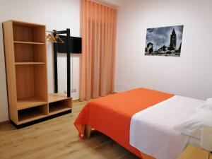 A bed or beds in a room at Nonna Elvira