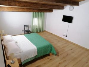 A bed or beds in a room at Nonna Elvira Még 22 kép