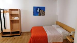 A bed or beds in a room at Nonna Elvira