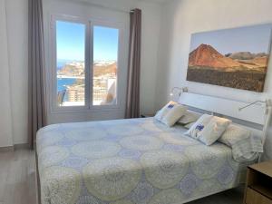 Postel nebo postele na pokoji v ubytování Casa Aita - refurbished apartment with unparalleled sea view