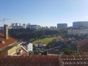 a view of a city with buildings in the background at Zabava Odivelas in Odivelas