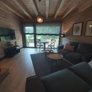 Posezení v ubytování Casa Sallent con bañera hidromasaje y jardín + 1 fotografie