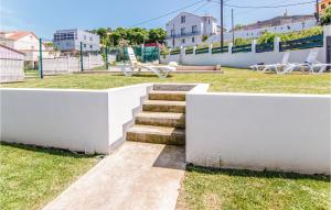 A garden outside Awesome Home In Noia With Wifi