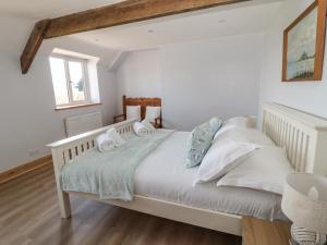 En eller flere senge i et værelse på 24 Hauxley Links