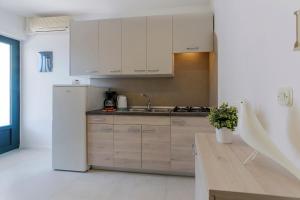 Kuchyňa alebo kuchynka v ubytovaní Apartment Zulijani A4