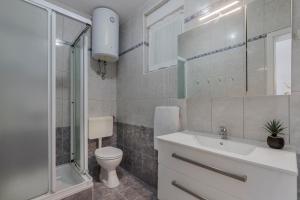Kúpeľňa v ubytovaní Apartment Zulijani A4 + 19 fotografií