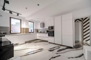 O bucătărie sau chicinetă la Niro Residence