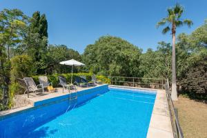 Bazén v ubytování Sunset private Eco-Villa Can Vey nebo v jeho okolí