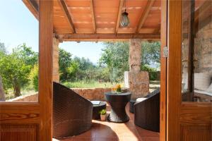 Posezení v ubytování Sunset private Eco-Villa Can Vey