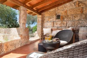 Posezení v ubytování Sunset private Eco-Villa Can Vey