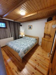 Кровать или кровати в номере Śumska kuća