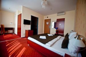 Posteľ alebo postele v izbe v ubytovaní Canada Hotel Budapest