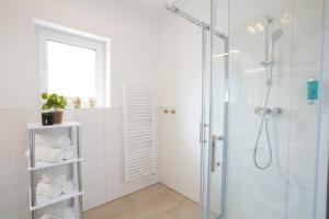 Kúpeľňa v ubytovaní CT-GOLD Apartments - Villach Malina - nahe Atrio und Therme + 37 fotografií