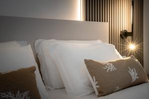 Posteľ alebo postele v izbe v ubytovaní Hotel Delfino