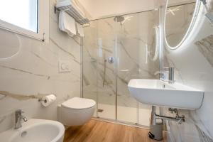 Kúpeľňa v ubytovaní Hotel Delfino