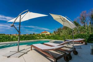 Bazén v ubytovaní Apartments Pool alebo v jeho blízkosti