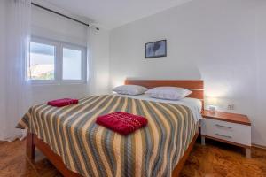 Posteľ alebo postele v izbe v ubytovaní Apartments Pool