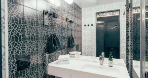 Koupelna v ubytování Hotel AX