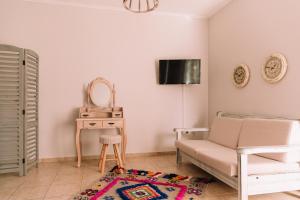 Μια τηλεόραση ή/και κέντρο ψυχαγωγίας στο Ammos Boutique Hotel