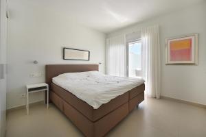 Ένα ή περισσότερα κρεβάτια σε δωμάτιο στο HigueronRentals Hill Manon