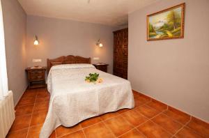 Ένα ή περισσότερα κρεβάτια σε δωμάτιο στο Casa Campu 1