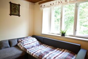 Кровать или кровати в номере Holiday Home 'Pekovo 1825'