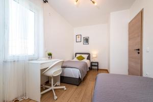 Posteľ alebo postele v izbe v ubytovaní Del Mar Heritage & Sea view Apartment