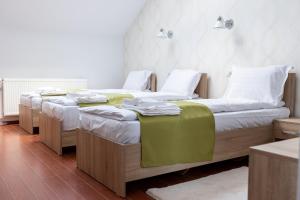 Postel nebo postele na pokoji v ubytování MARCONI GUESTHOUSE