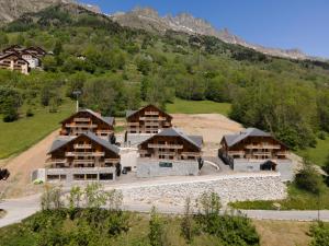an aerial view of a lodge in a mountain at TERRESENS - LES EDELWEISS in Vaujany