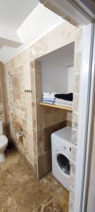 Kúpeľňa v ubytovaní Apartamenty Mikołajki na Kajki
