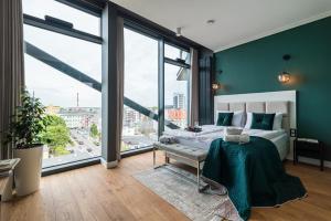 Posteľ alebo postele v izbe v ubytovaní Q18 ApartHotel