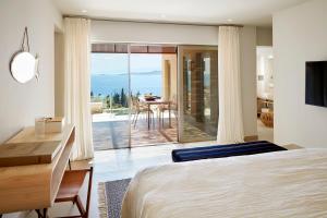 Posteľ alebo postele v izbe v ubytovaní Eagles Villas - Small Luxury Hotels of The World