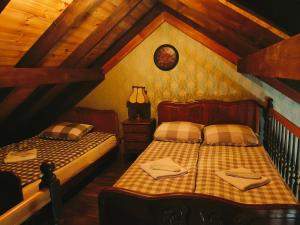 Łóżko lub łóżka w pokoju w obiekcie Westernland