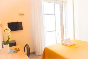 TV a/nebo společenská místnost v ubytování Hotel Suprem sul Mare