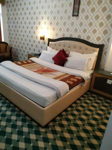 Letto o letti in una camera di Lords Residency