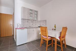 Kuchyň nebo kuchyňský kout v ubytování Apartments Vlado i Vesna