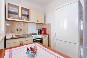 Kuchyň nebo kuchyňský kout v ubytování Apartments Vlado i Vesna