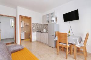 Kuchyň nebo kuchyňský kout v ubytování Apartments Vlado i Vesna