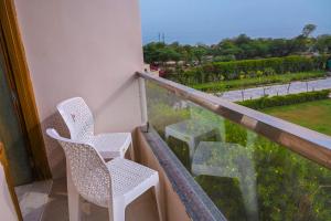 Rõdu või terrass majutusasutuses The Govindam Resort