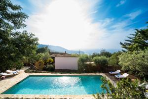 The swimming pool at or close to CA'N QUINN