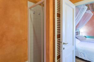 Posteľ alebo postele v izbe v ubytovaní PODERE PRATOVECCHIO 14&2, Emma Villas