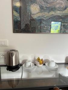 Příslušenství pro přípravu čaje a kávy v ubytování Albergo Wellness Da Febo