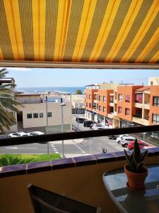 a view from a window of a parking lot at Casa Árida, Morro Jable in Morro del Jable