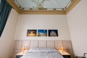 A bed or beds in a room at Le Camere dei Conti